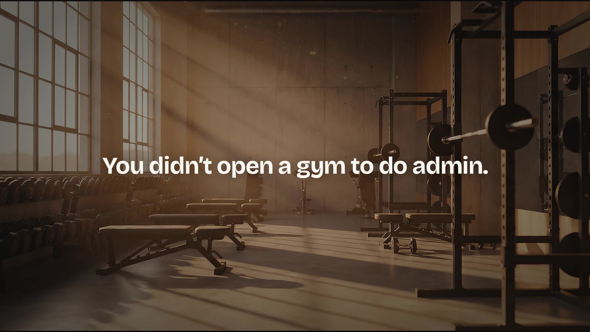 Still from the Gym Stack 360 film: an empty gym at dawn, captioned &ldquo;You didn&rsquo;t open a gym to do admin.&rdquo;